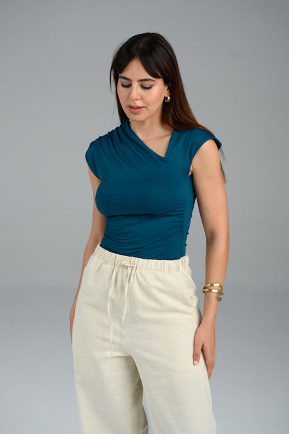 Top asymétrique Lyra